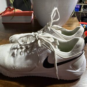 Nike White Athletic Shoes with Black Logo